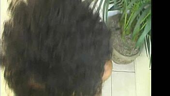 island Trinidad hottie Foxy Roxy showers and sucks ebony cock teasingly