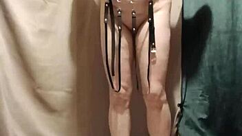 bound milf maid chained in harness submits to dildo humiliation