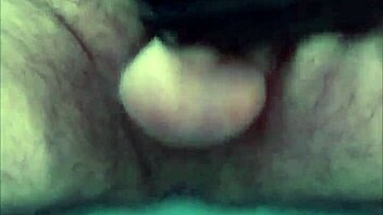 guy strokes cock hard with latex gloves and ring on