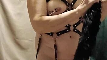 bound milf maid chained in harness submits to dildo humiliation