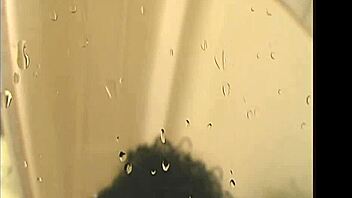 island Trinidad hottie Foxy Roxy showers and sucks ebony cock teasingly