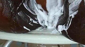 Black milf shaves wet pussy closeup orgasm