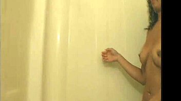 island Trinidad hottie Foxy Roxy showers and sucks ebony cock teasingly