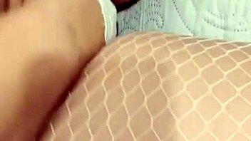 latina slips toy into ass during intimate play session