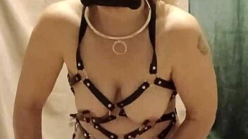 bound milf maid chained in harness submits to dildo humiliation