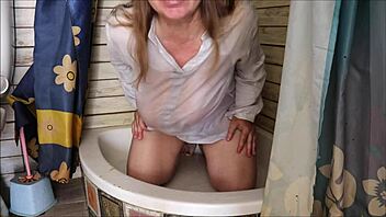 Dirty busty granny squirts urine fetish play