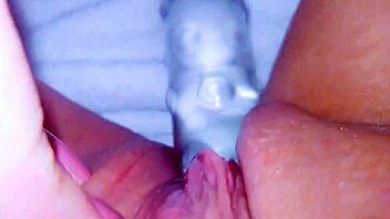 curious coed squirts huge on glass toy watching?