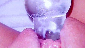 curious coed squirts huge on glass toy watching?