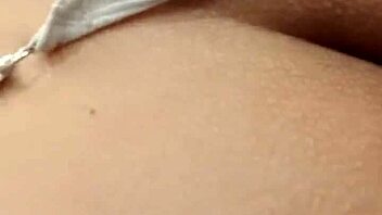 latina slips toy into ass during intimate play session