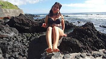 hidden foot fetish tease from curvy seductress on crowded beach