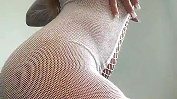 Big tits beauty slowly undresses revealing her perfect ass