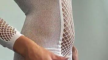 Big tits beauty slowly undresses revealing her perfect ass