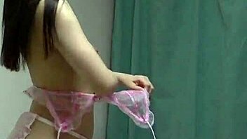 himeno amasaki slowly strips sheer lingerie for tiny bikini reveal on webcam