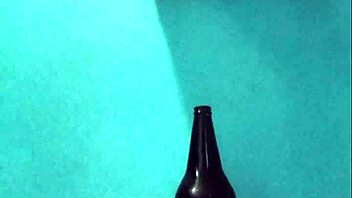 Curvy latina masturbates richly with bottle on pussy