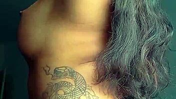 Tattooed Prostitute Flaunts Tight Ass Closeup