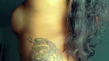 Tattooed Prostitute Flaunts Tight Ass Closeup