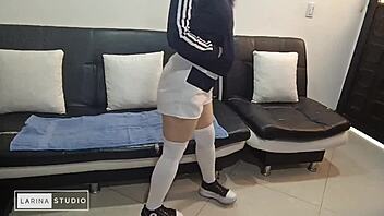 curvy latina shows off big ass in long stockings shorts