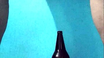 Curvy latina masturbates richly with bottle on pussy