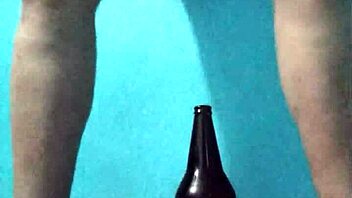 Curvy latina masturbates richly with bottle on pussy