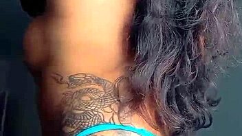 Tattooed Prostitute Flaunts Tight Ass Closeup