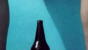 Curvy latina masturbates richly with bottle on pussy