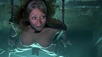 Bound sub gets punished hard in water bondage garage