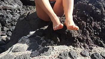 hidden foot fetish tease from curvy seductress on crowded beach