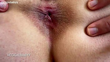 close up asshole spreads winks rubs spit all over