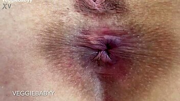 close up asshole spreads winks rubs spit all over