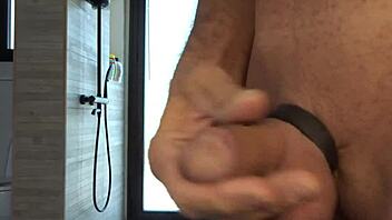 guy plays with his small oiled cock during masturbation session