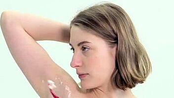 Sweaty teen shaves her smooth sexy pussy closeup