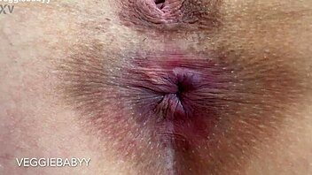 close up asshole spreads winks rubs spit all over