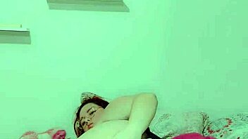 Hey, watch this hot redhead finger her soaking wet pussy now?