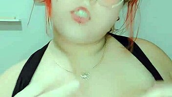 Hey, watch this hot redhead finger her soaking wet pussy now?