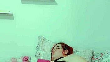 Hey, watch this hot redhead finger her soaking wet pussy now?