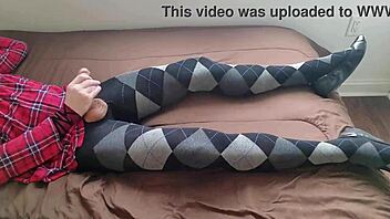 Watch this shemale jerk hard in plaid dress tights?