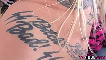 blonde inked shemale feels horny in lingerie solo