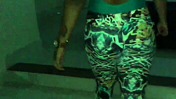 she tries on new lycra leggings and body suit excitedly