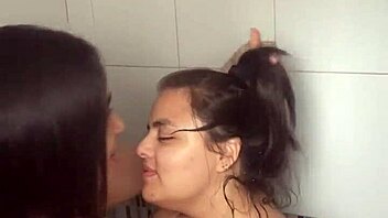 Two Bathing Beauties Lick and Film Steamy Lesbian Shower