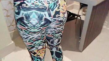 she tries on new lycra leggings and body suit excitedly