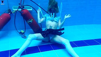 Skinny sexy Latina Ashlee Rose teases underwater in pool