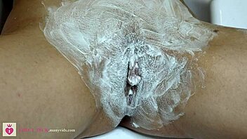 Intimate close-up hairy pussy transformed into smooth shaved delight