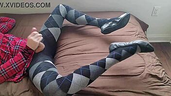 Watch this shemale jerk hard in plaid dress tights?