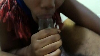 Ebonyski mask slut deepthroats big black cock and swallows cum