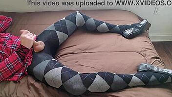 Watch this shemale jerk hard in plaid dress tights?