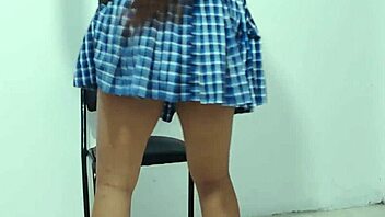 busty 18-year-old student films content while seated on waiting room chair