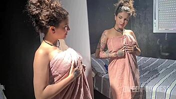 after her bath she lotions her big tits feeling super horny and starts masturbating wildly