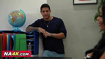 professor anissa kate chats casually with students selina bentz and mike ox about their group project