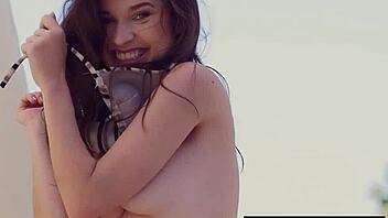 serena wood strips outdoors showing her natural tits and shaved pussy