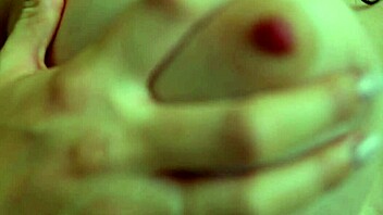 She teases small perky nipples up close intimately